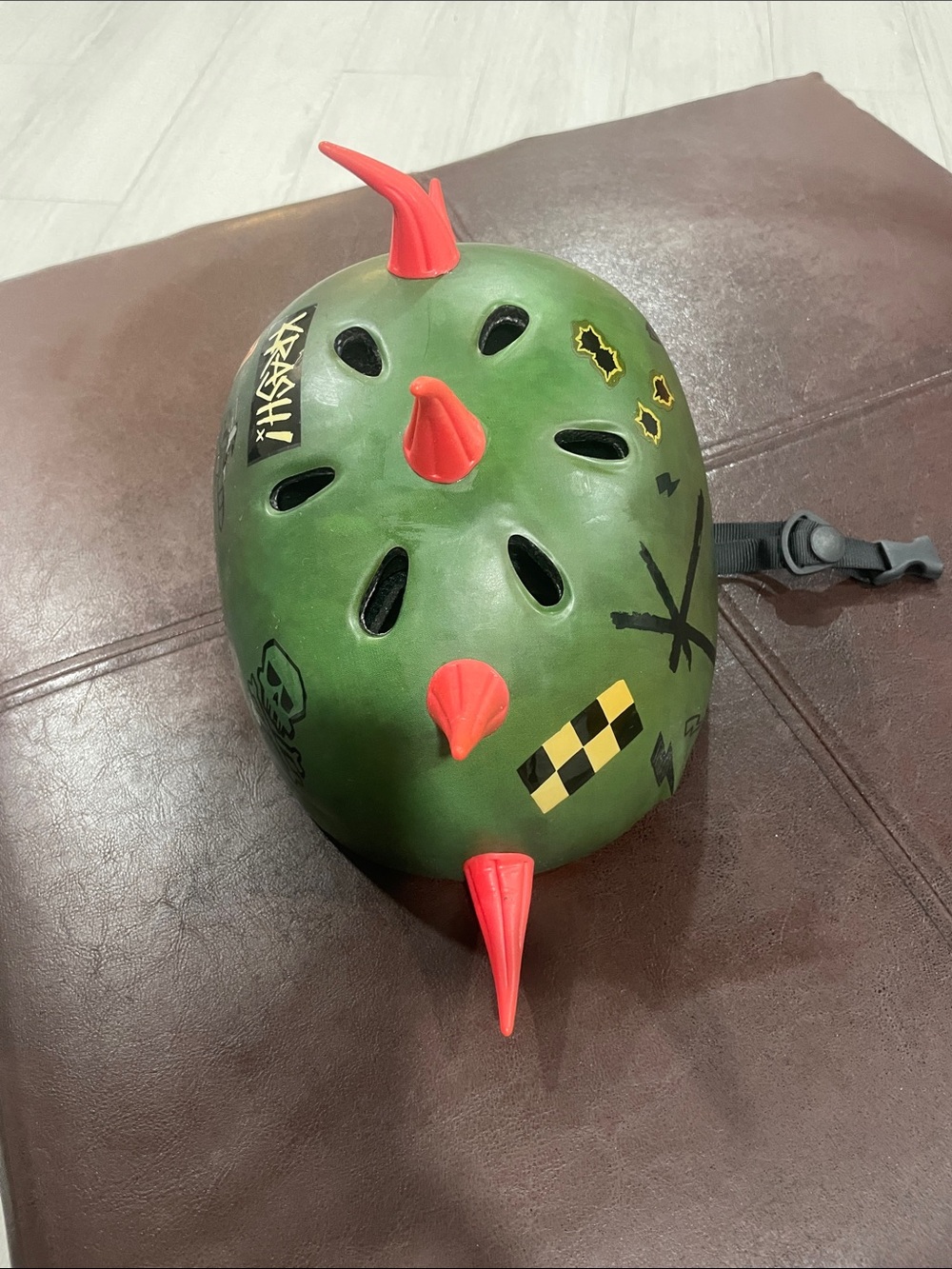 FUN Green BICYCLE Helmet with Red Spikes and Graphic Decals
